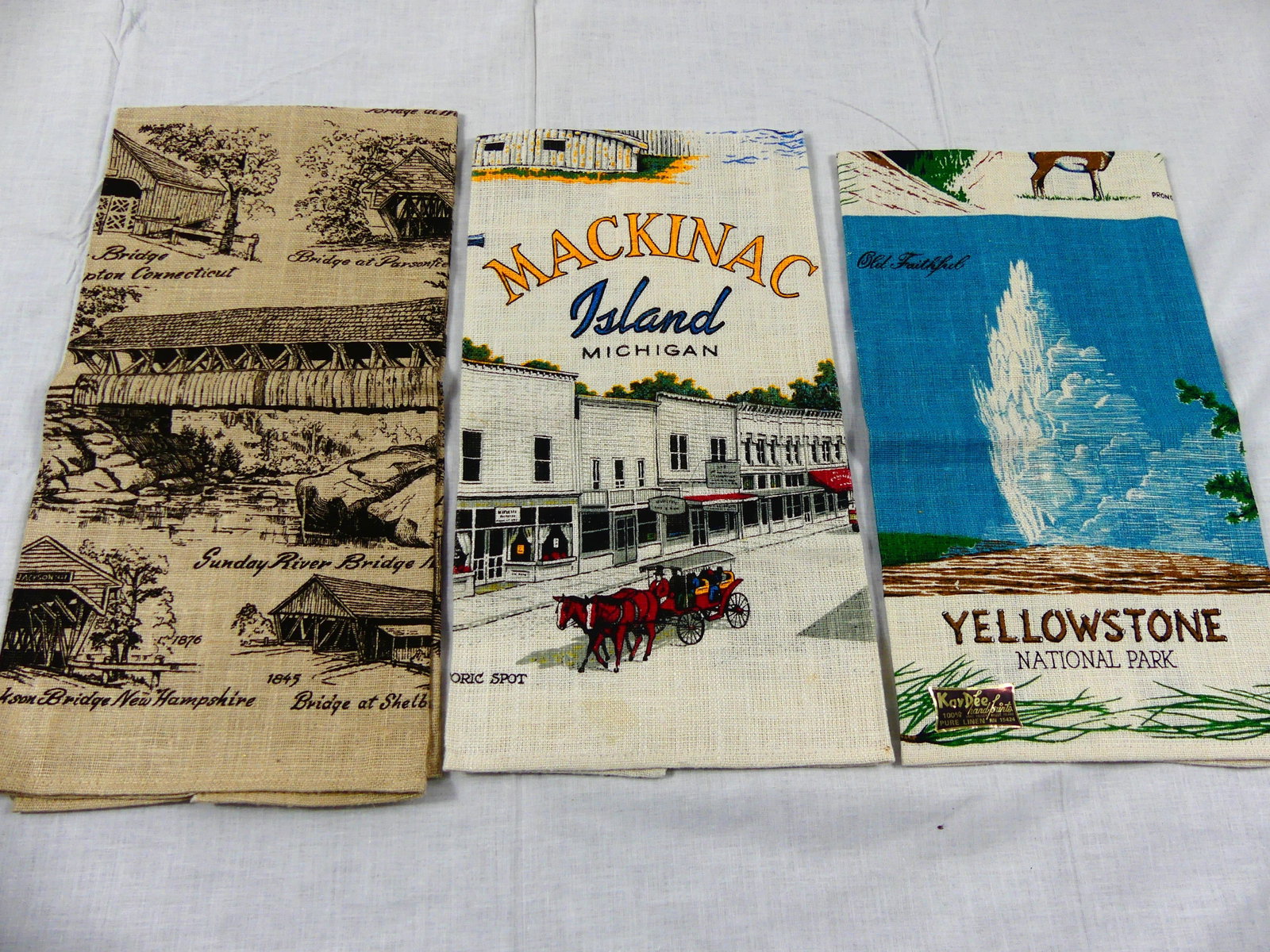 THREE VINTAGE 1960s/70s SOUVENIR TEA TOWELS: approx. 17" x 28", staining at edges, see photos