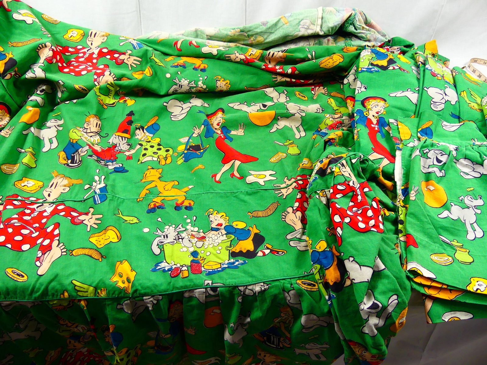 FOUR VINTAGE DAGWOOD & BLONDIE PRINTED PANELS W/ MATCHING VALANCES: Same textile in alternate colorway held at Goldstein Museum of Design, deaccession #2001-046.001
