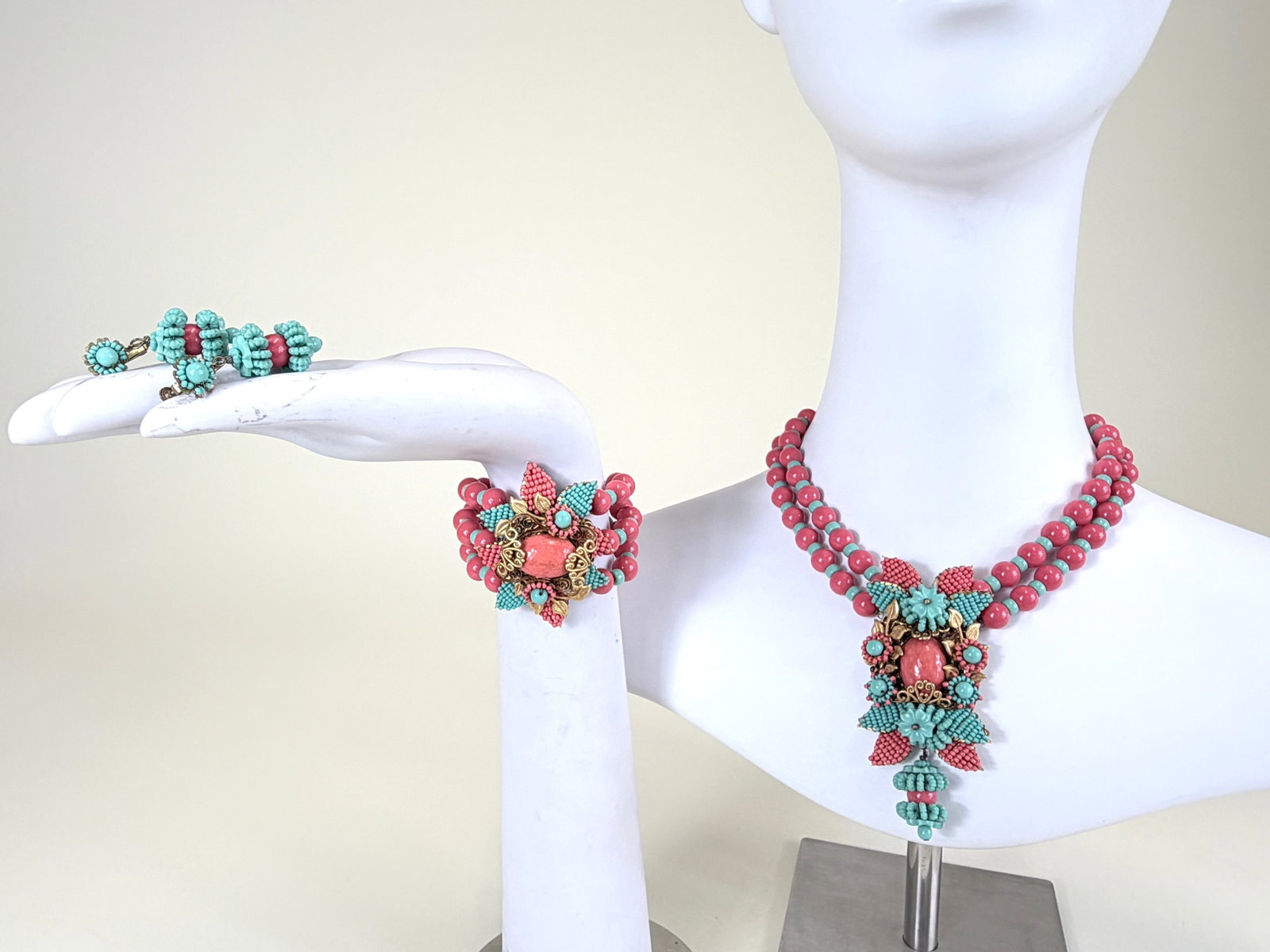 VINTAGE MIRIAM HASKELL DEMI PARURE: All pieces stamped "Miriam Haskell", necklace 16"-18", pendant 4" x 1.75", clamp bracelet medallion 2" x 2.5", earrings 1.75", warping on bracelet, see photos