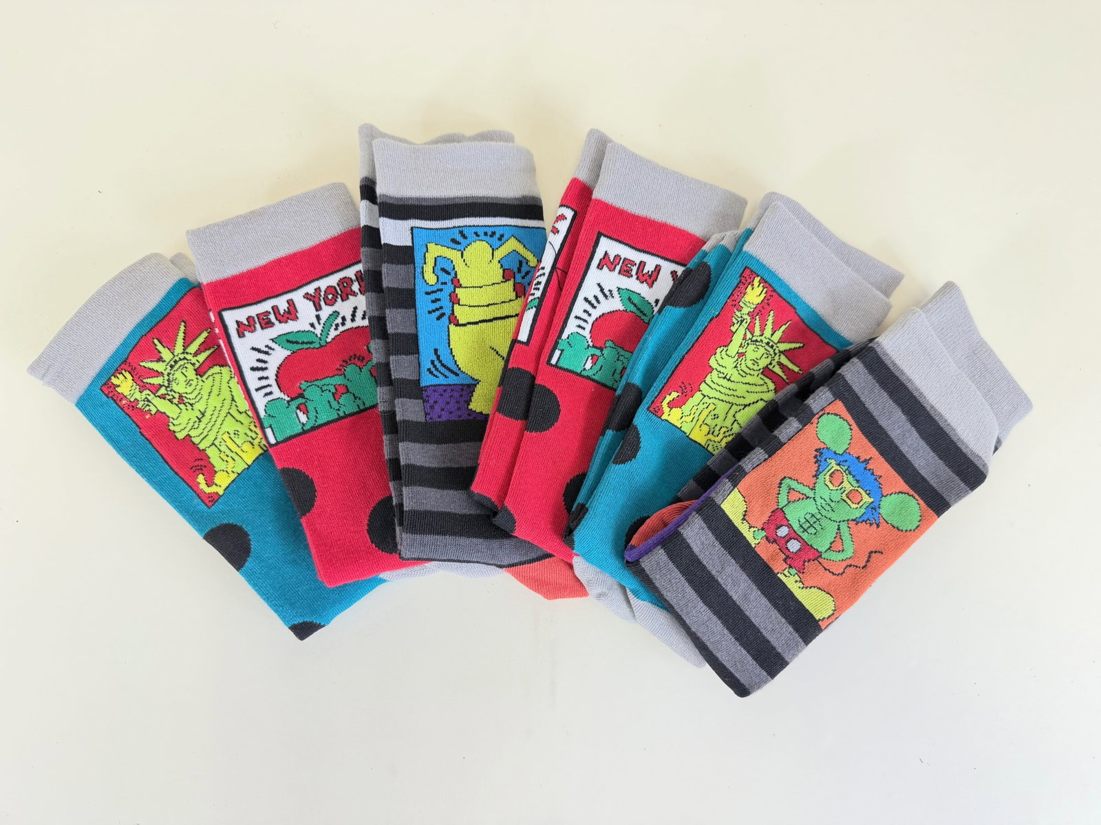 SIX PAIRS KEITH HARING SOCKS: Good condition