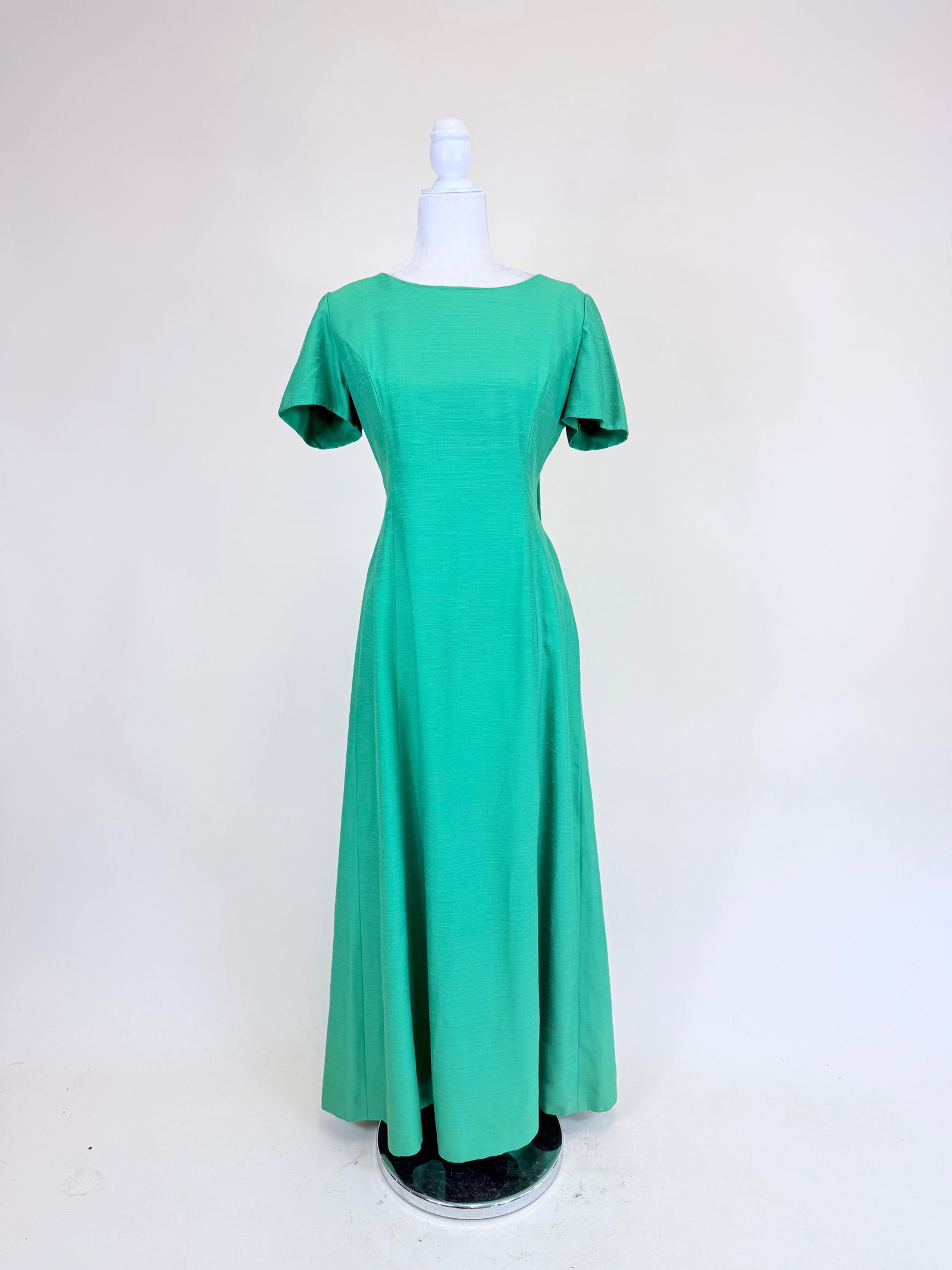 KELLY GREEN SHANTUNG EVENING DRESS, 1960s: comes w/ dress pattern, B 37", W 32", wear/discoloration to detachable back panel, see photos