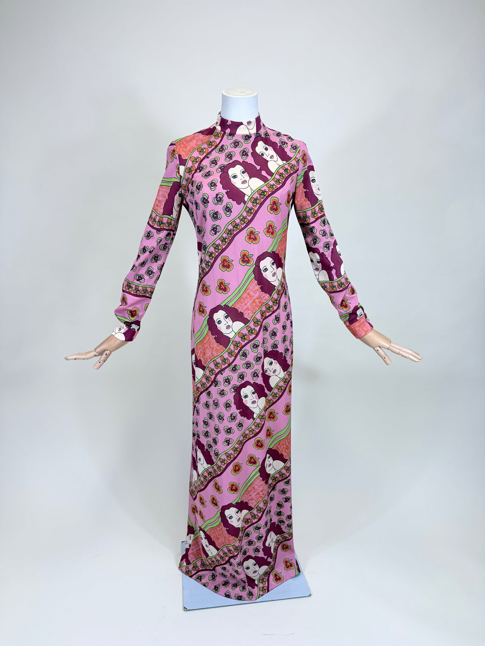 CIRETTE OF CALIFORNIA PINUP PRINTED MAXI DRESS, 1970s: B 36", W 30", tiny stains, see photos. Provenance: From the M. Estella Sprague Costume Collection