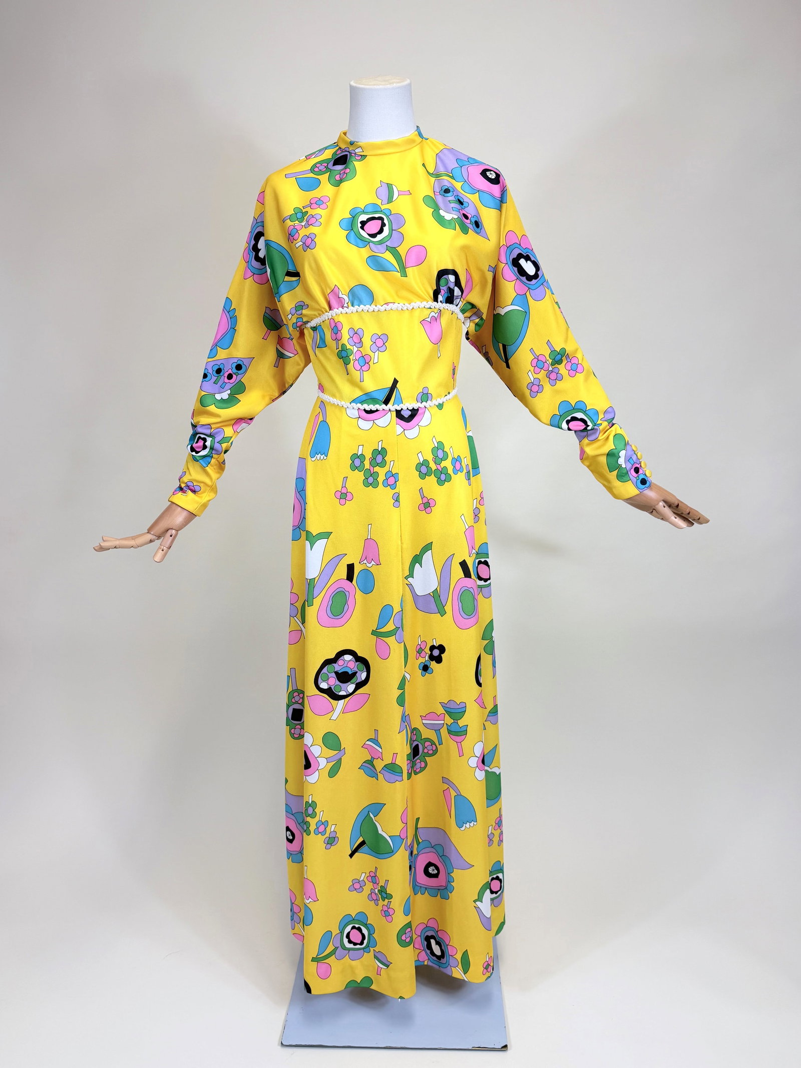 FLORAL PRINTED MAXI DRESS, 1970s: W 26", light discoloration at waist, good condition, see photos. Provenance: From the M. Estella Sprague Costume Collection