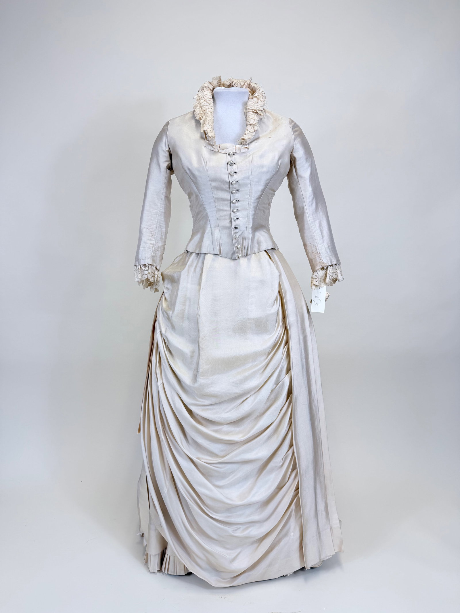ANTIQUE FINE SILK FAILLE & BLOND LACE WEDDING GOWN, c. 1880: B 32", W 24", skirt W 23", L 40", light watermarks to cuffs, few holes in lace cuffs & collar, wears spots/holes to left shoulder, few spot stains, silk band at CF B detaching, 1 button replaced, skir