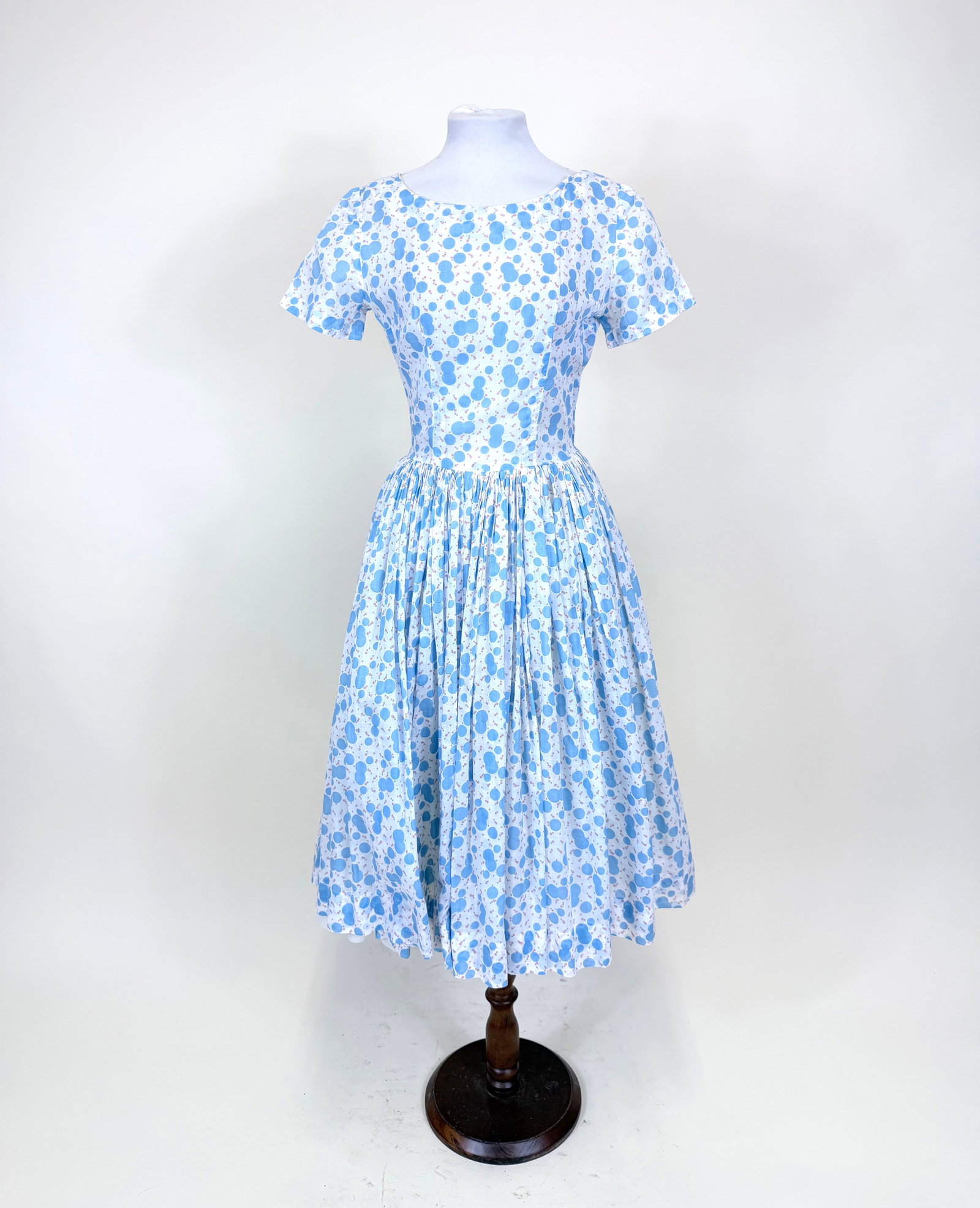 BLUE & PINK IRREGULAR POLKA DOT PRINTED COTTON MULL DRESS, 1950s: B 32", W 22", straining & reinforcement at bust darts, see photos.