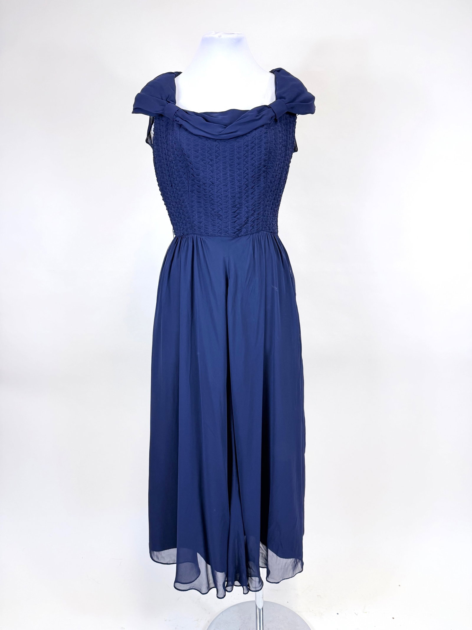 NAVY GEORGETTE EVENING DRESS, 1950s: B 37", W 25", one tiny hole to skirt, good condition, see photos