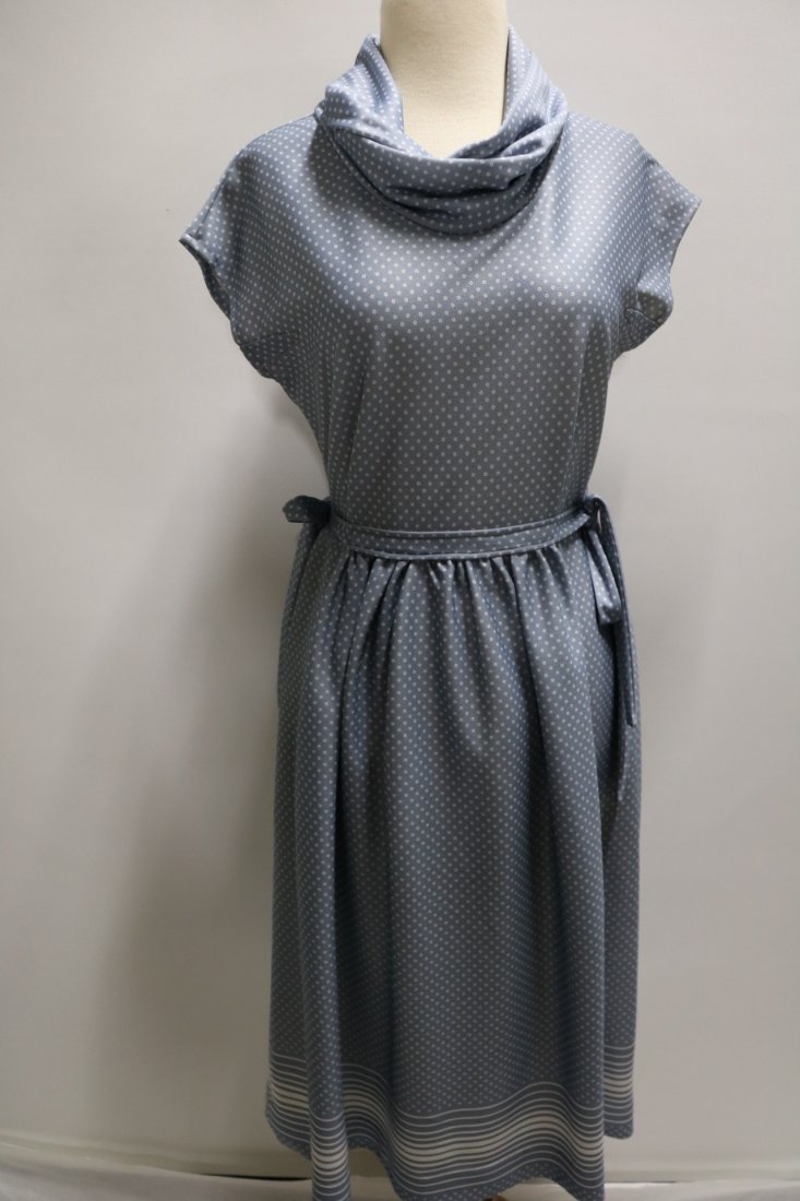 1970's Blue dot polyester by Debbi Bee: Cowell neck dress with ties at both sides of waist, cap sleeves, stripe at hem, back zipper, approx. 36 bust 32 waist