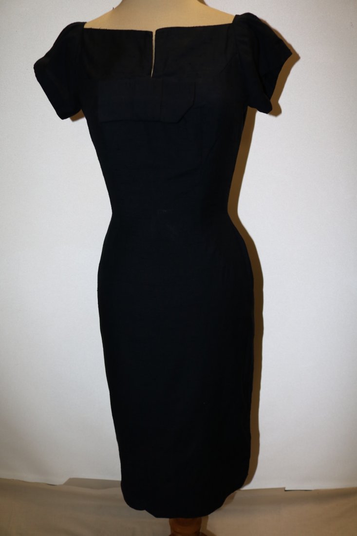 1950/60 Navy Blue Classic Silhouette Dress: fitted waist, boat neck with slit & bow, short pouf sleeves, darts at waist, linen blend, approx. 36 bust, 26 waist