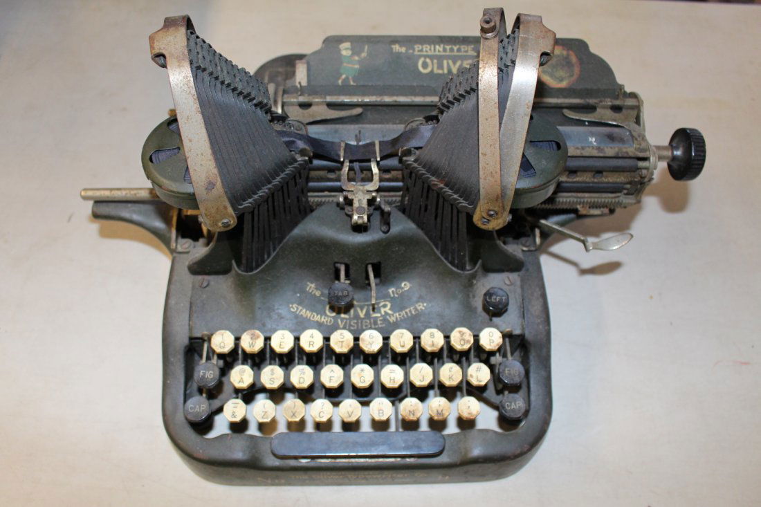The Printype Oliver Typewriter No. 9: With extra ribbon by Pinnacle in original box. Manufactured by The Oliver Typewriter Co. Pat. Nov. 5th 1912