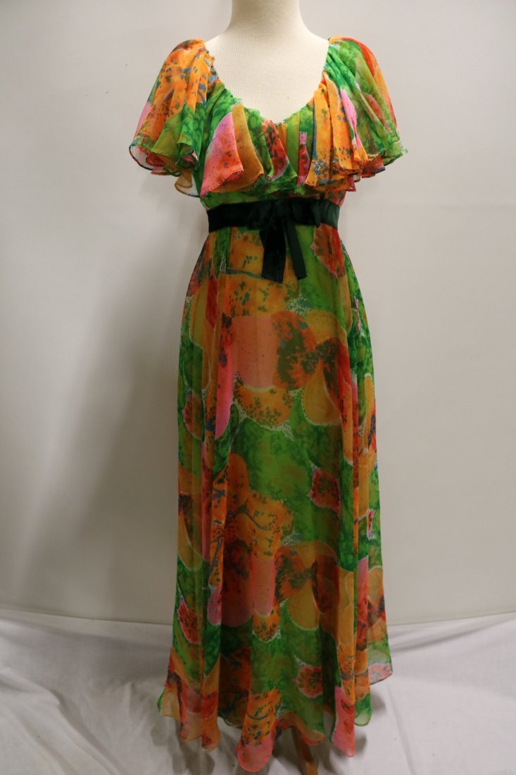 Vintage 1970s orange, green and pink large scale floral: Measurements (measured in inches) Bust 36" Empire Waist 28" Hips 40" Length 56" Shoulder to Empire Waist 12.5" Label: Lendzions, New Haven Michigan Material: Chiffon, Nylon, Velvet Condition: Excellen