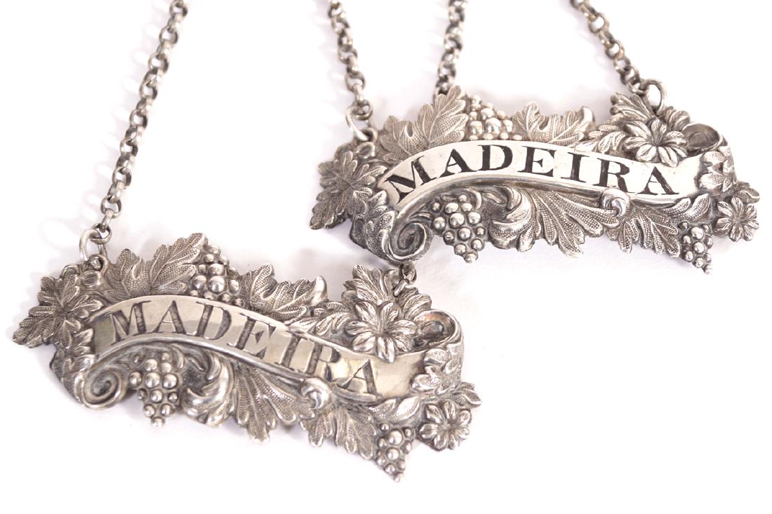 PAIR OF SILVER WINE LABELS: PAIR OF SILVER WINE LABELS Madeira, with trailing vine decoration, Maker John Taylor & John Perry of Birmingham, 1838, 25 g