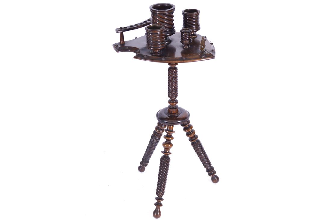 NINETEENTH-CENTURY MAHOGANY AND BRASS BOUND TOBACCO: the heart shaped and fitted top, raised on spiral turned legs Dimensions:90 cm. high; 40 cm. wide; 45 cm. deep