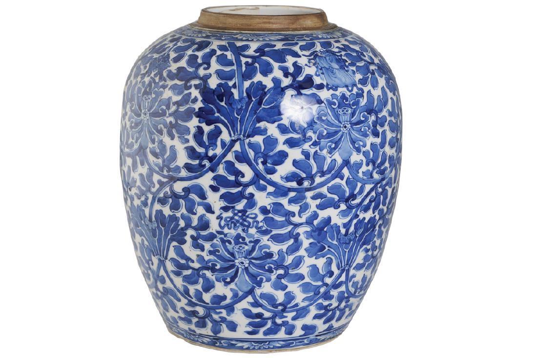 CHINESE QING PERIOD BLUE AND WHITE GINGER JAR: CHINESE QING PERIOD BLUE AND WHITE GINGER JAR of bulbous form, with all over leaf and floral decoration Dimensions: 30 cm. high; 23 cm. diameter