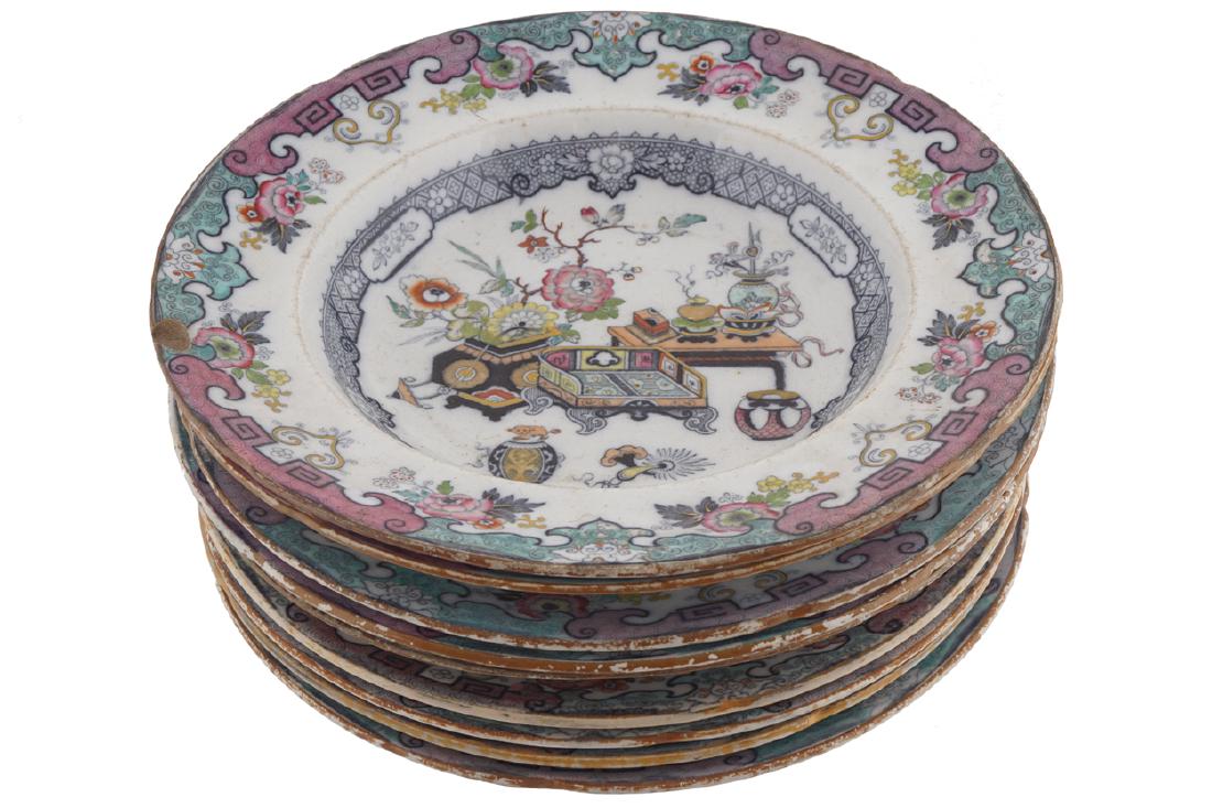 SET OF TEN IRONSTONE CHINA PLATES: each with polychrome Chinoiserie decoration