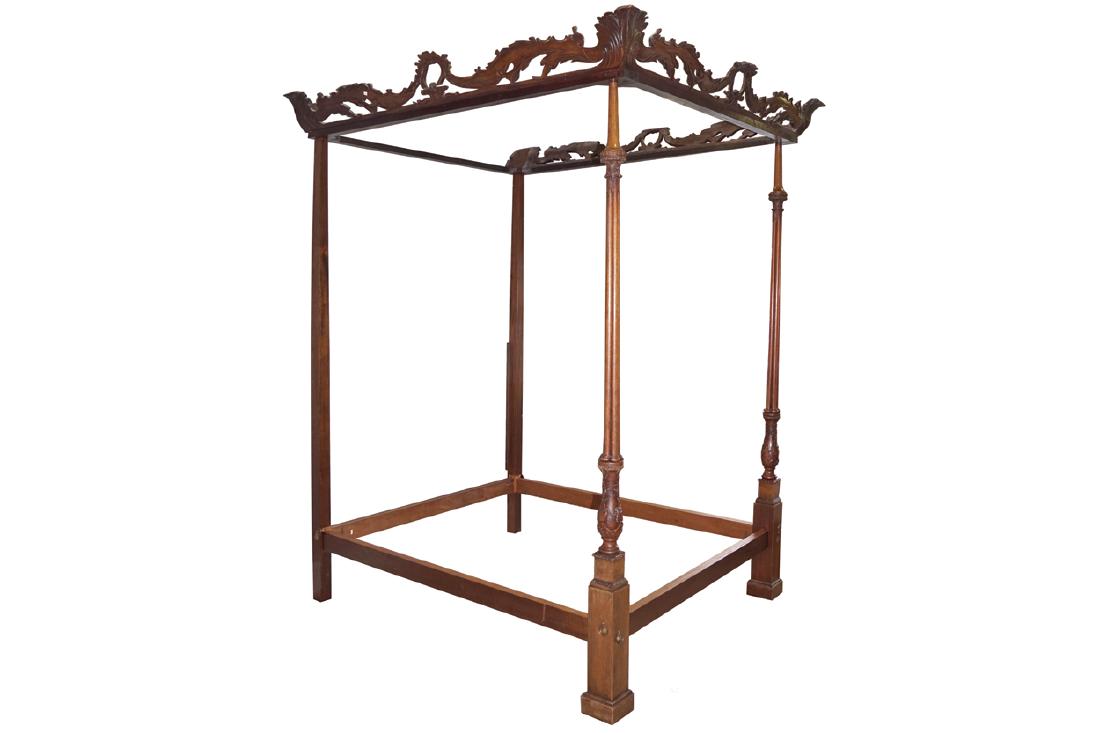 GEORGE III STYLE MAHOGANY FOUR POSTER BED: the rich scrolling canopy supported on turned and reeded pillars to the fore Dimensions: 263 cm. high; 171 cm. wide; 192 cm. wide