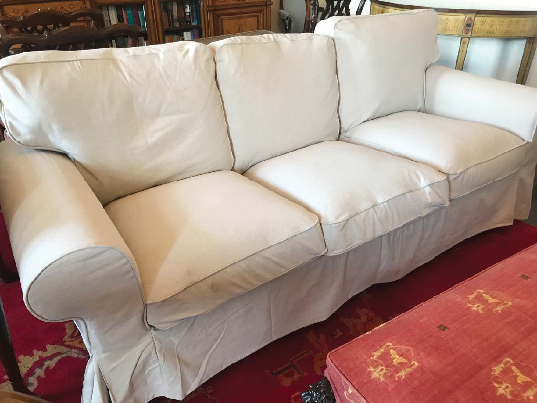 PAIR OF MODERN THREE-SEATER SETTEES: each with loose cushioned seats