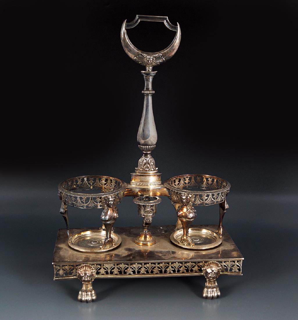 FRENCH EMPIRE STERLING SILVER DECANTER STAND: Dimensions: 34 cm. high; 23 cm. wide