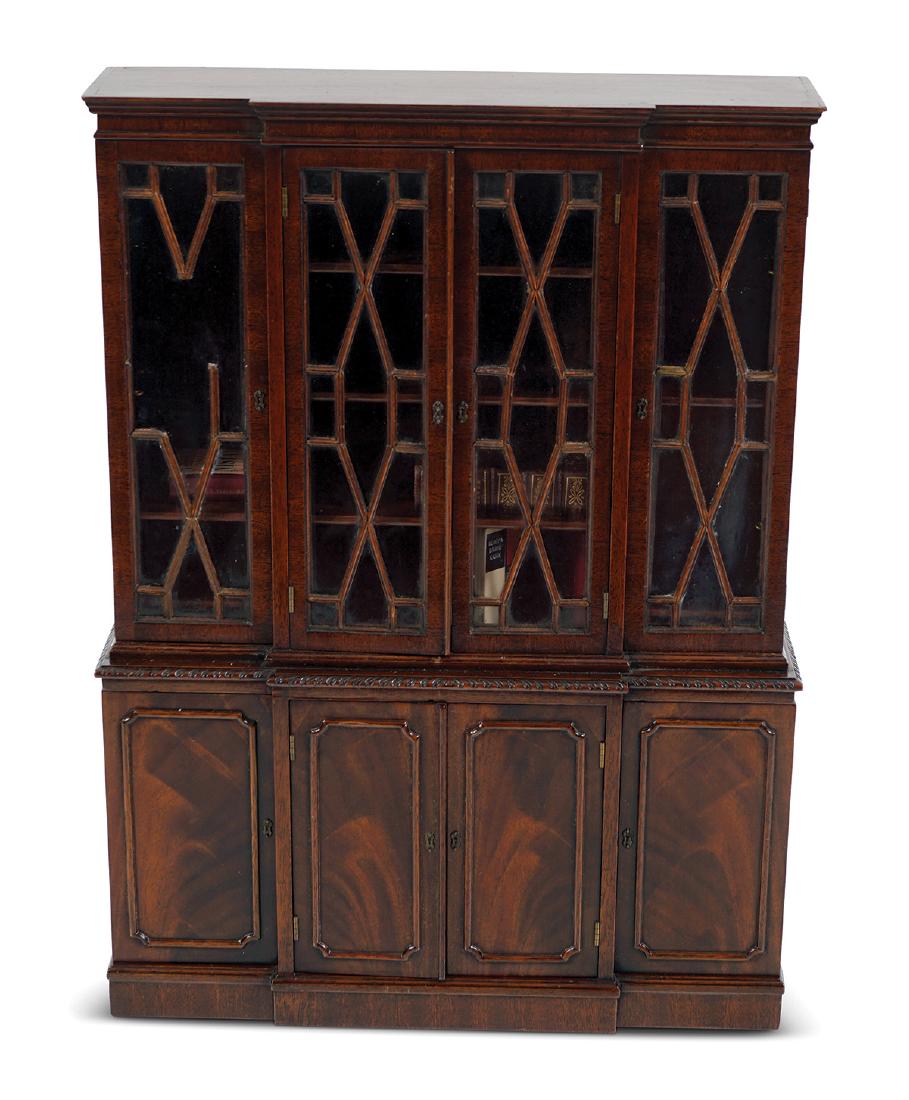 MINIATURE GEORGE III MAHOGANY BREAKFRONT BOOKCASE: 48 cm. high; 33 cm. wide