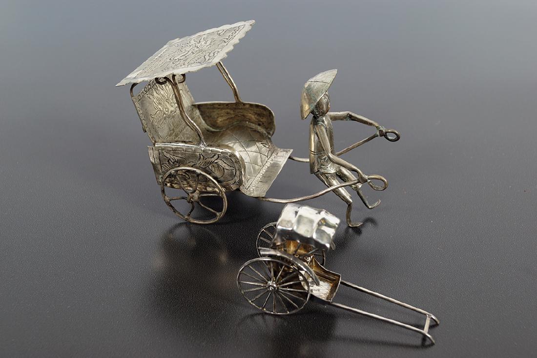 TWO ANTIQUE CHINESE SILVER TABLE: decorations in the form of rickshaws, one by Wang Hing, c. 1920