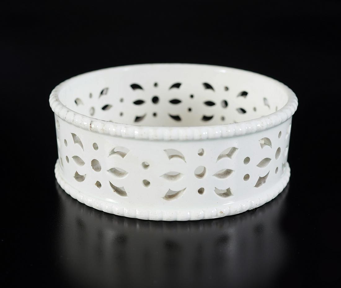 REGENCY WEDGWOOD CREAMWARE WINE BOTTLE COASTER: with fretted rim 9 cm. diameter