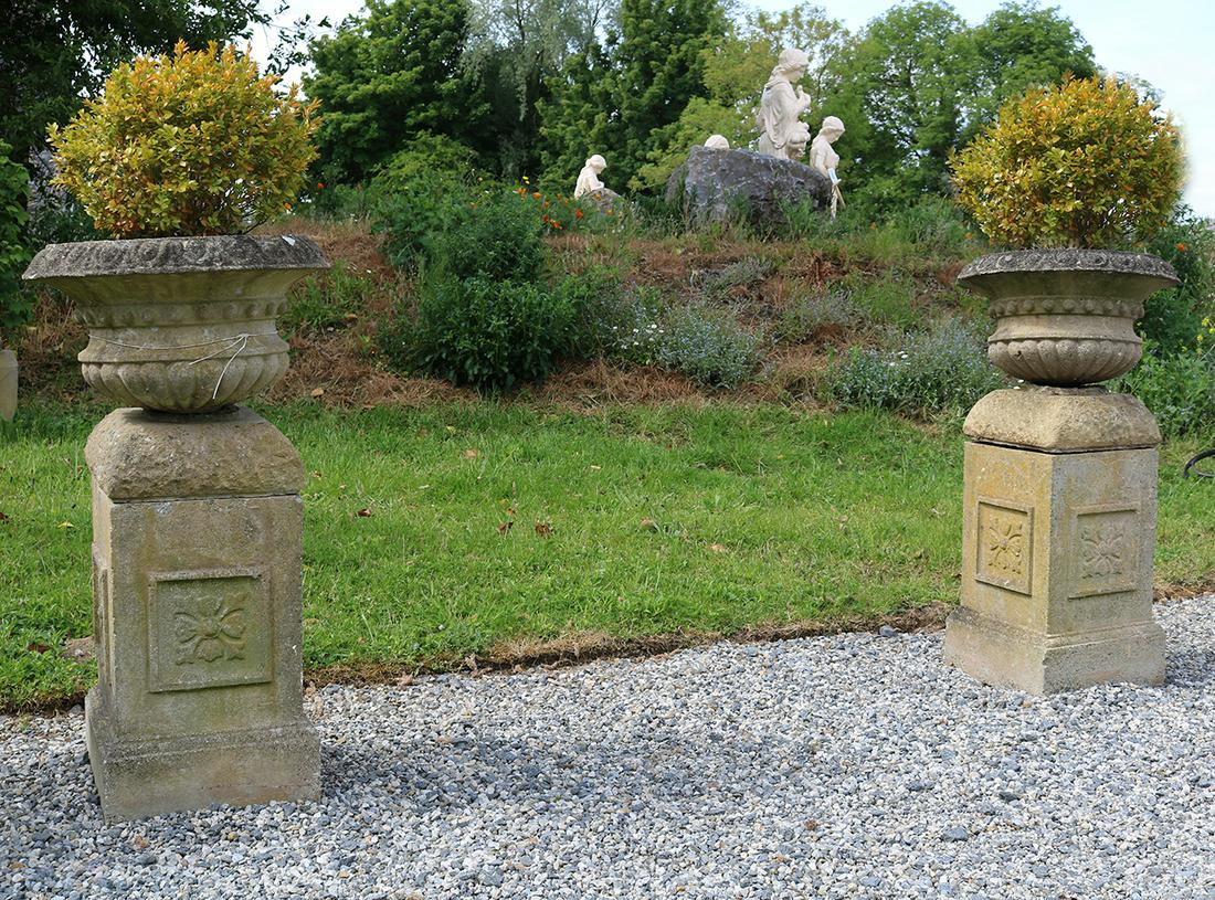 PAIR OF EARLY 20TH-CENTURY MOULDED STONE URNS (1 of 3)
