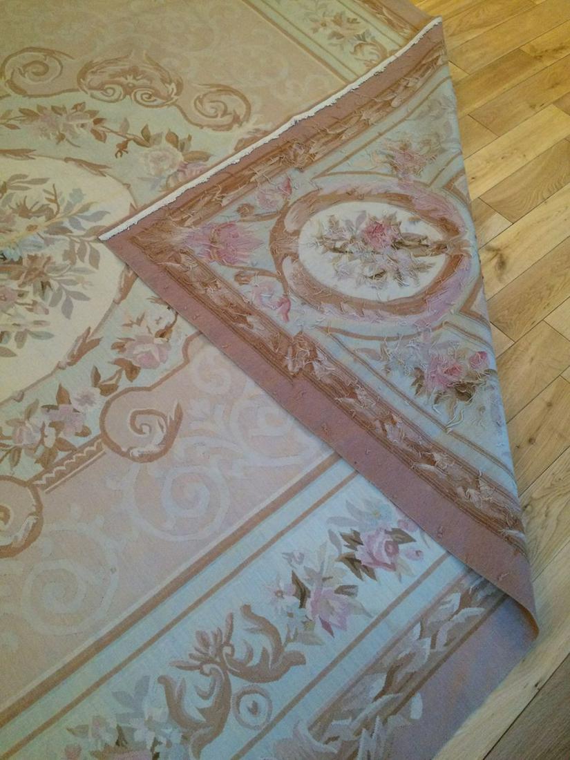 AUBUSSON CARPET: with ivory rosette medallion 355 x 276 cm.