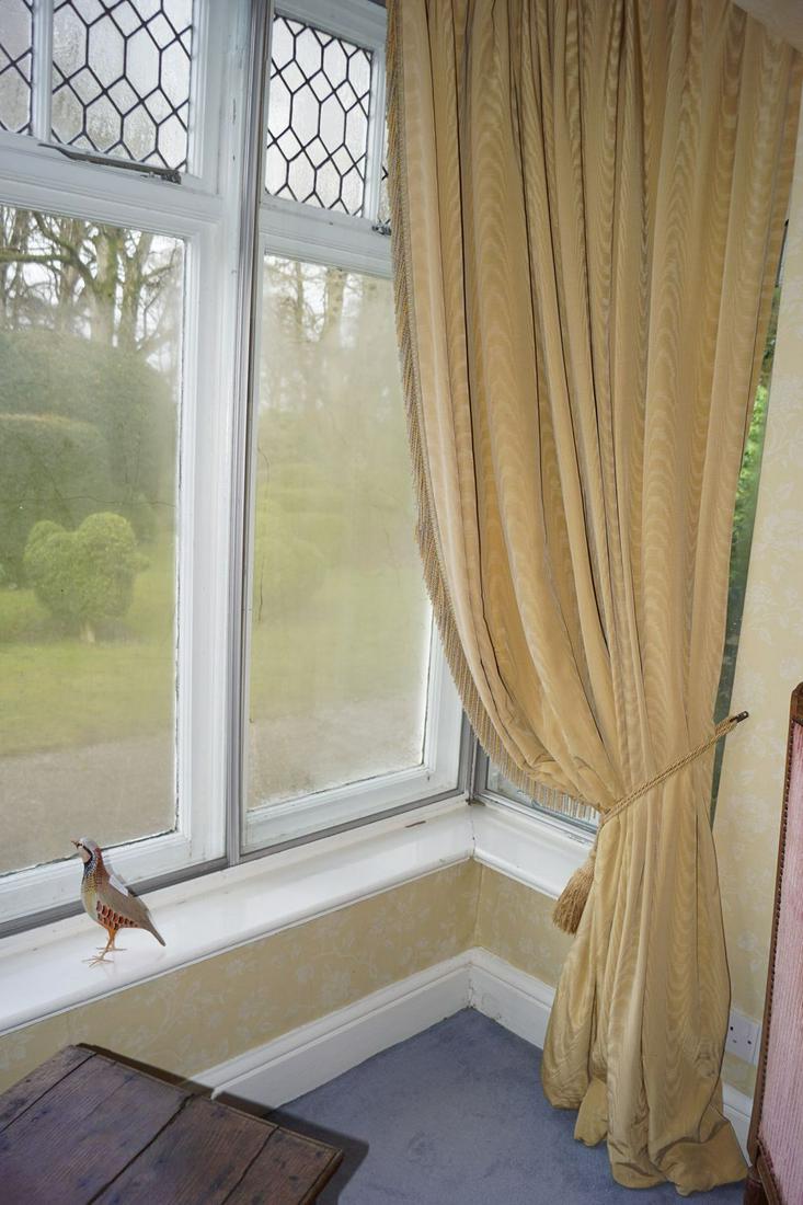 PAIR OF DESIGNER SILK MOIRE CURTAINS: each lined and interlined, with tassel edging, complete with tie backs 242 cm. high; each width 236 cm. wide