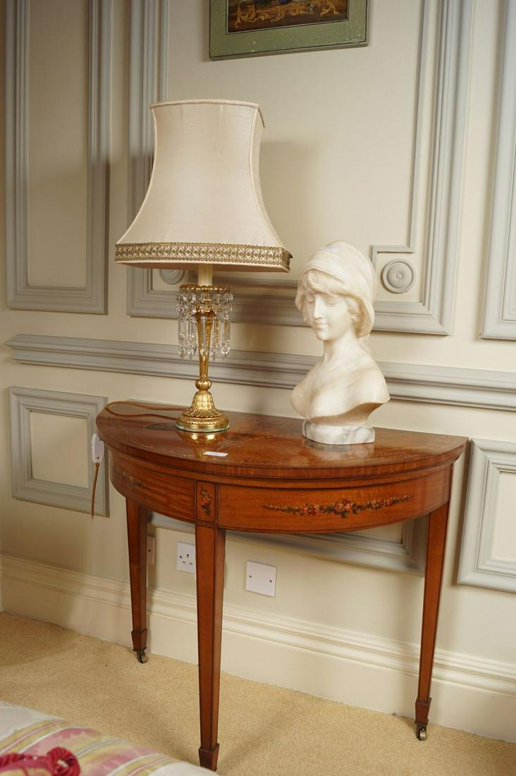 EDWARDIAN SATINWOOD & PAINTED SIDE TABLE: the demi-lune shaped top, above a conforming frieze, raised on square tapered legs 84 cm. wide