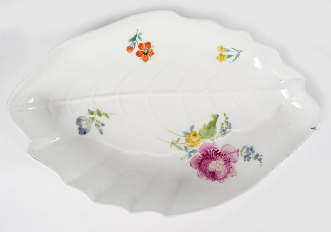 MEISSEN BOWL: of leaf shape with floral decoration 26 cm. high; 17 cm. wide