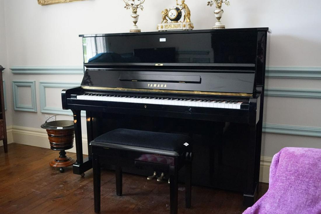 YAMAHA UPRIGHT PIANO: Model: UI Nippon Gakki, overstrung. 120 cm. high; 15 cm. wide; 63 deep