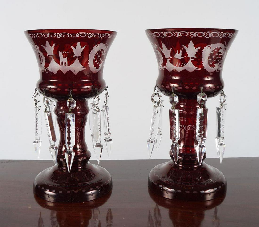 PAIR OF 19TH-CENTURY CRANBERRY GLASS EPERGNES: each suspended with crystal prisms and engraved decoration. 25 cm. high