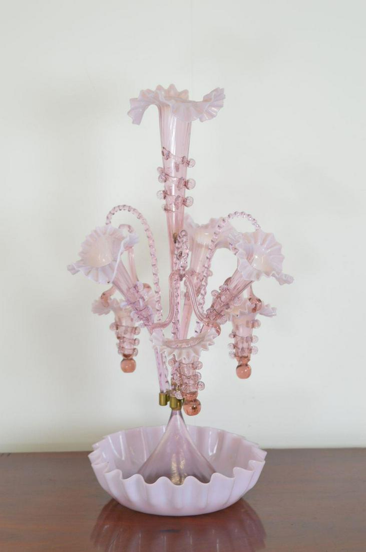 VASELINE GLASS EPERGNE: a series of flower shaped vases, on a circular serpentine shaped base. 61 cm. high; 40 cm. wide