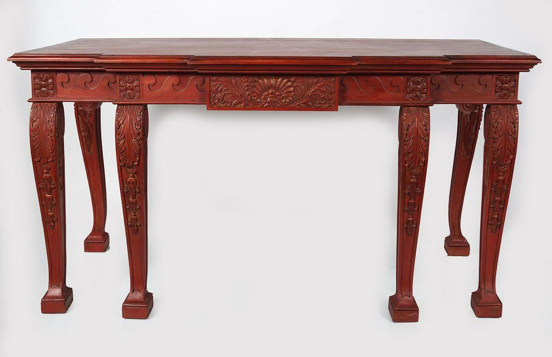 LARGE WILLIAM KENT STYLE POLYCHROME CONSOLE TABLE: the moulded edged rectangular double breakfront top above a Vitruvian scroll frieze centred by a leaf carved panel, raised on acanthus leaf carved scroll legs. 80 cm. high; 183 cm. wide