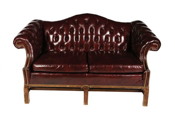 Pair leather deep buttoned settees: Pair hide upholstered deep buttoned Gainsborough humpback settees,each raised on square chamfered legs to the fore 120 cms. wide