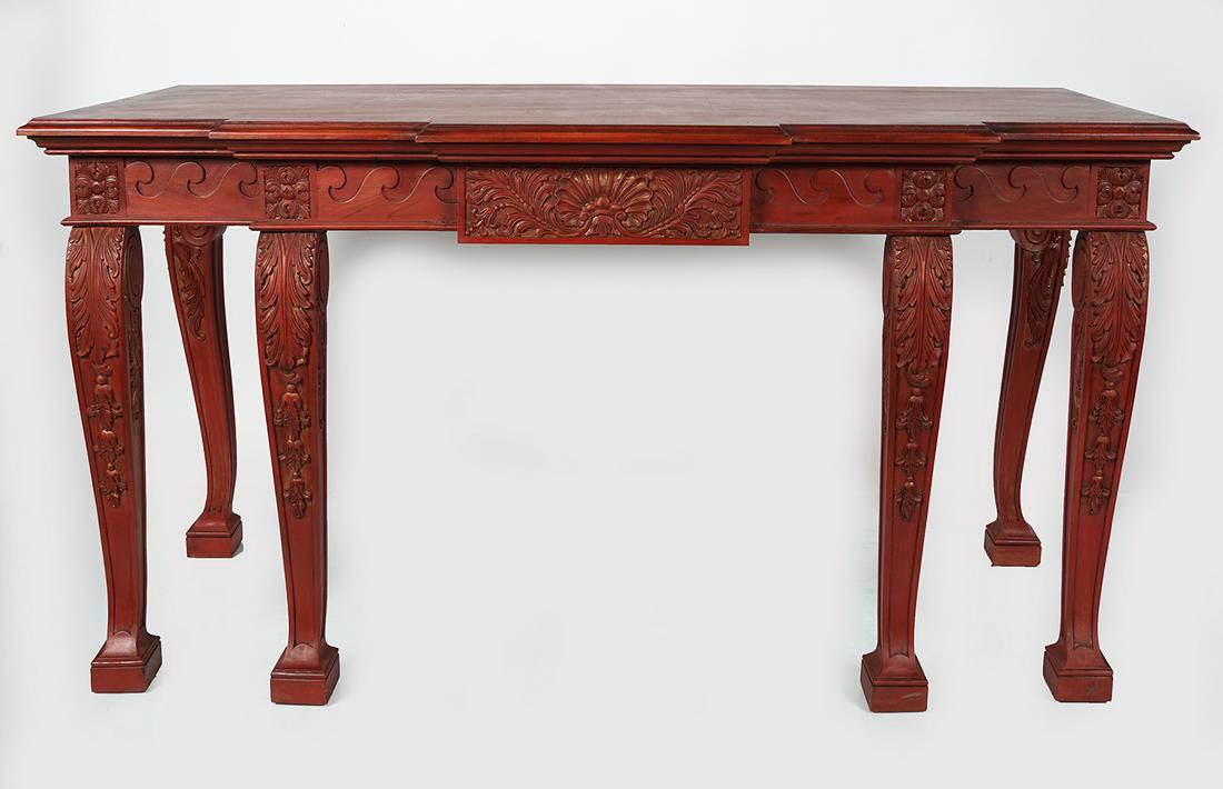 LARGE WILLIAM KENT STYLE POLYCHROME CONSOLE TABLE: the moulded edged rectangular double breakfront top above a Vitruvian scroll frieze centred by a leaf carved panel, raised on acanthus leaf carved scroll legs. 80 cm. high; 183 cm. wide