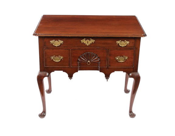 Eighteenth-century period mahogany low-boy: Eighteenth-century period mahogany low-boy,The rectangular top with eared corners to the fore; above a series of drawers centered on a scallop shell, raised on cabriole legs terminating on pad feet 80