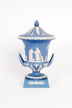 Wedgwood jasperware classical urn and cover: Wedgwood jasperware classical urn and cover,decorated with raised figures 27 cm. high