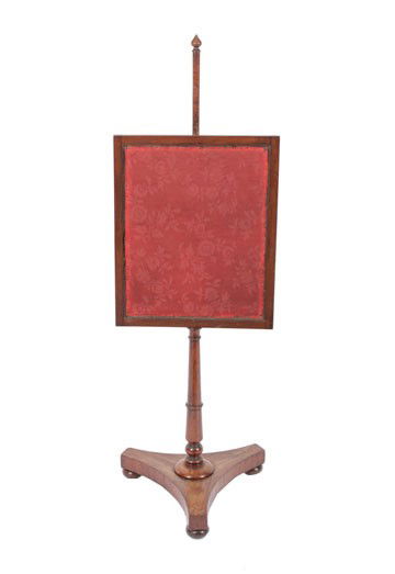 William IV period mahogany pole screen: William IV period mahogany pole screen,raised on a tri-part platform pod terminating on bun feet