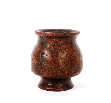 Early Chinese jade pot: Early Chinese jade pot,with incised leaf decoration, probably Han Dynasty (206 BC - 220 AD) 12 cm. high