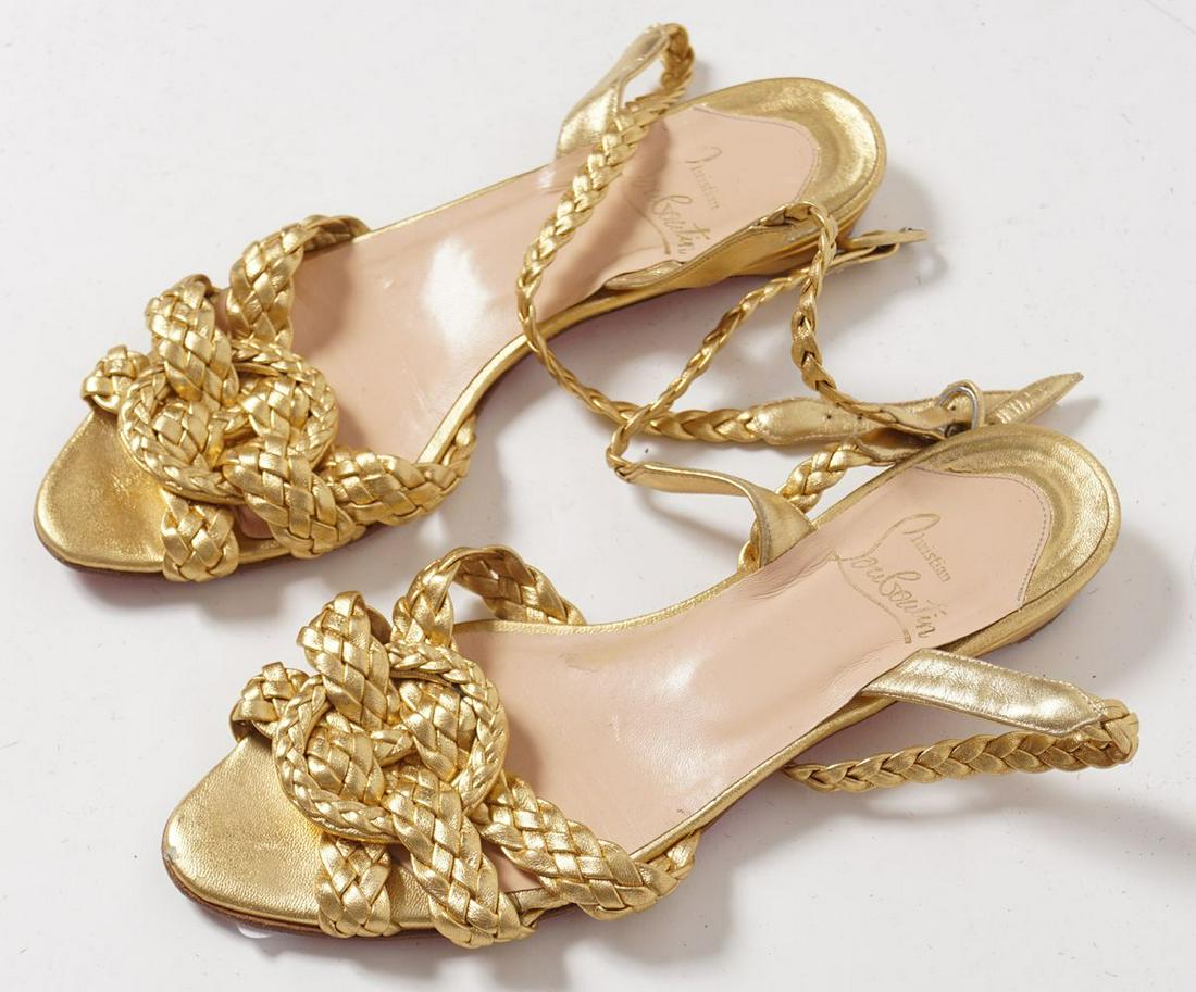 CHRISTIAN LOUBOUTIN GOLD SANDALS: Luxury French fashion designer Christian Louboutin. Flat gold sandals with rope effect straps in gold. EU37 / UK4