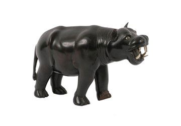 Carved nineteenth-century ebony hippopotamus: Carved nineteenth-century ebony hippopotamus Size: 12 cm. high