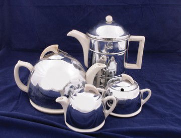 Art Deco four piece tea/coffee set: Art Deco four piece tea/coffee set,with beehive design Size: 22 cm. high