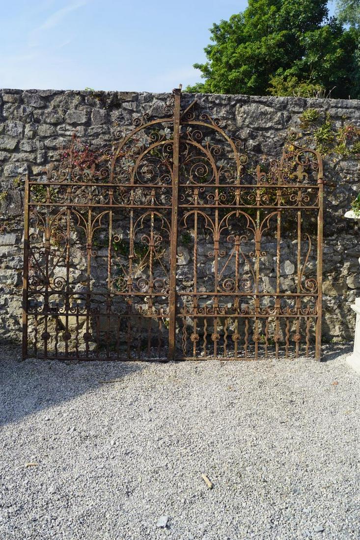 PAIR OF LARGE ESTATE ENTRANCE GATES: cast iron, with shamrock decoration. Maker's stamp Jones. 290 cm. high; 305 cm. wide Approximate Time: 10:00 Lot No: 2 Category: Garden & Decorative Objects