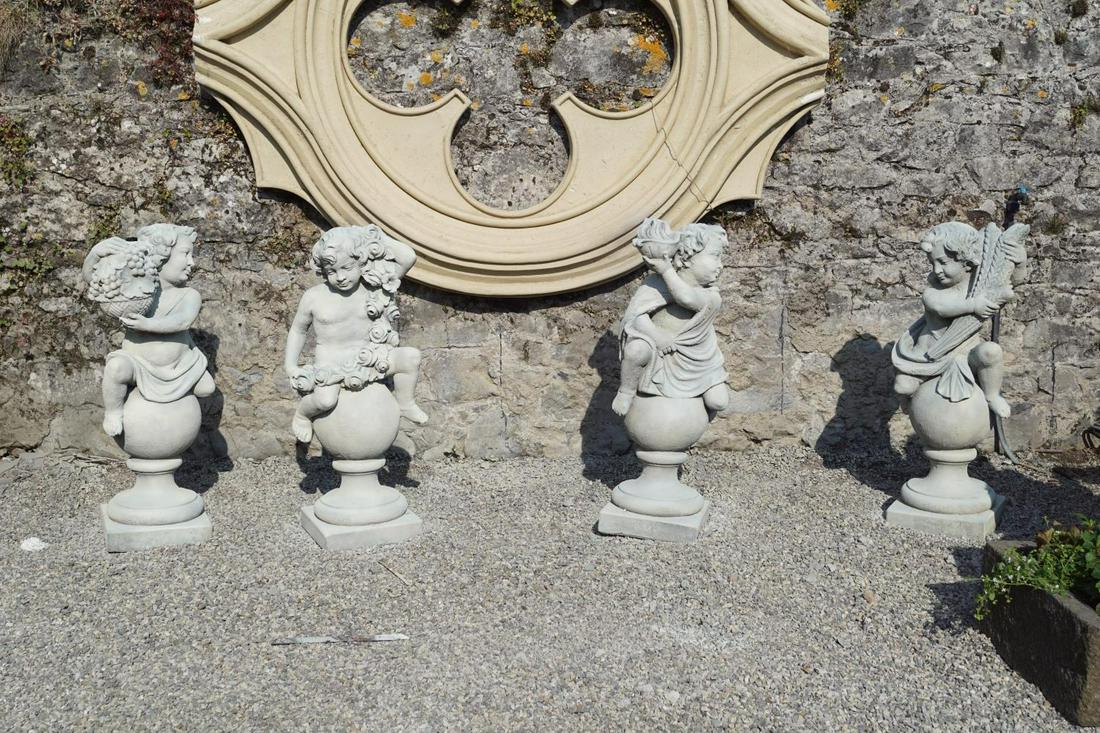 GROUP OF 4 ITALIANATE GARDEN SCULPTURES: each a putto, representing one of the 4 Seasons. Approximate Time: 10:01 Lot No: 3 Category: Garden & Decorative Objects