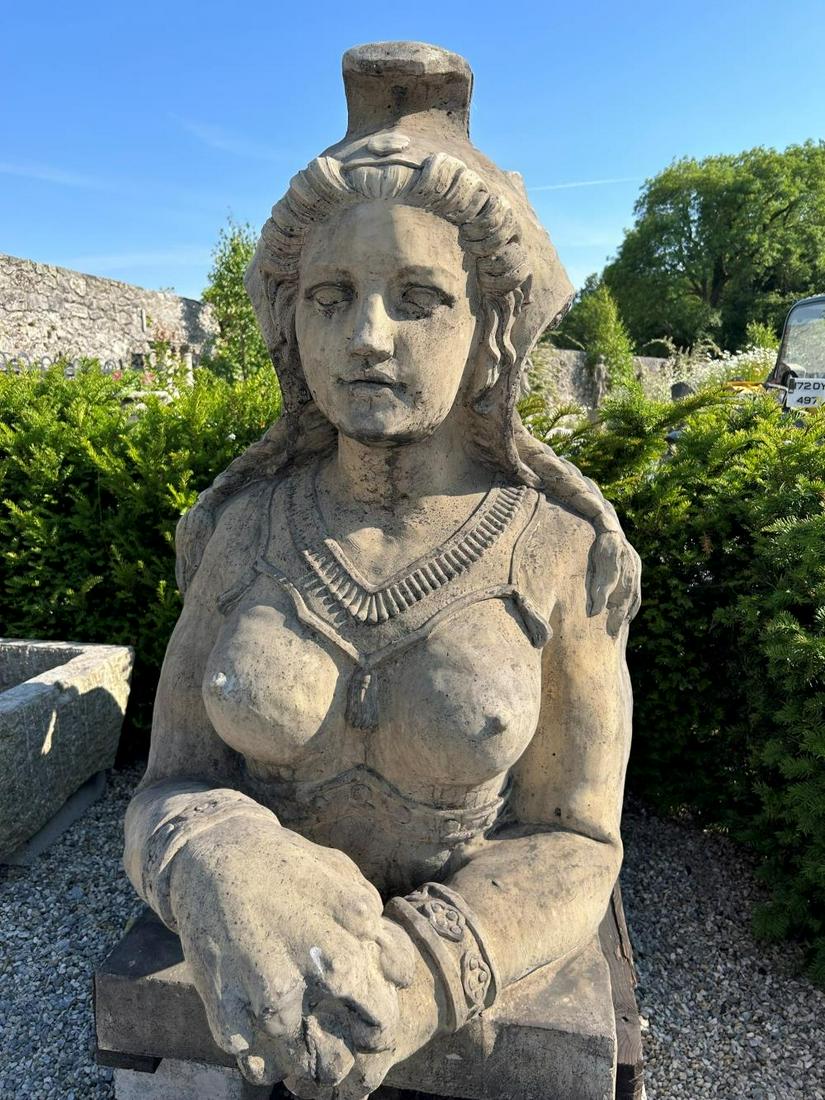 PAIR OF LARGE STONEWARE SPHINX: each with a putto on its back. 130 cm. high; 160 cm. deep; Approximate Time: 10:03 Lot No: 5 Category: Garden & Decorative Objects