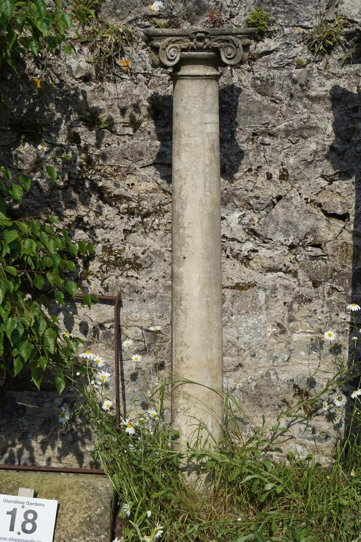 PAIR OF SANDSTONE CLASSICAL COLUMNS: each raised on a square base. 170 cm. high; 33 cm. in diameter; Approximate Time: 10:16 Lot No: 19 Category: Garden & Decorative Objects