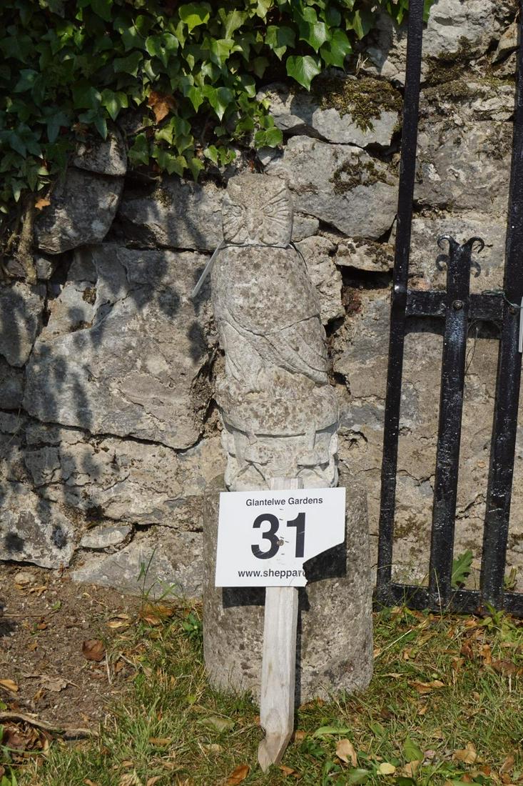 PAIR OF MOULDED STONE OWLS: each resting on a circular plinth. 90 cm. high; Approximate Time: 10:27 Lot No: 31 Category: Garden & Decorative Objects