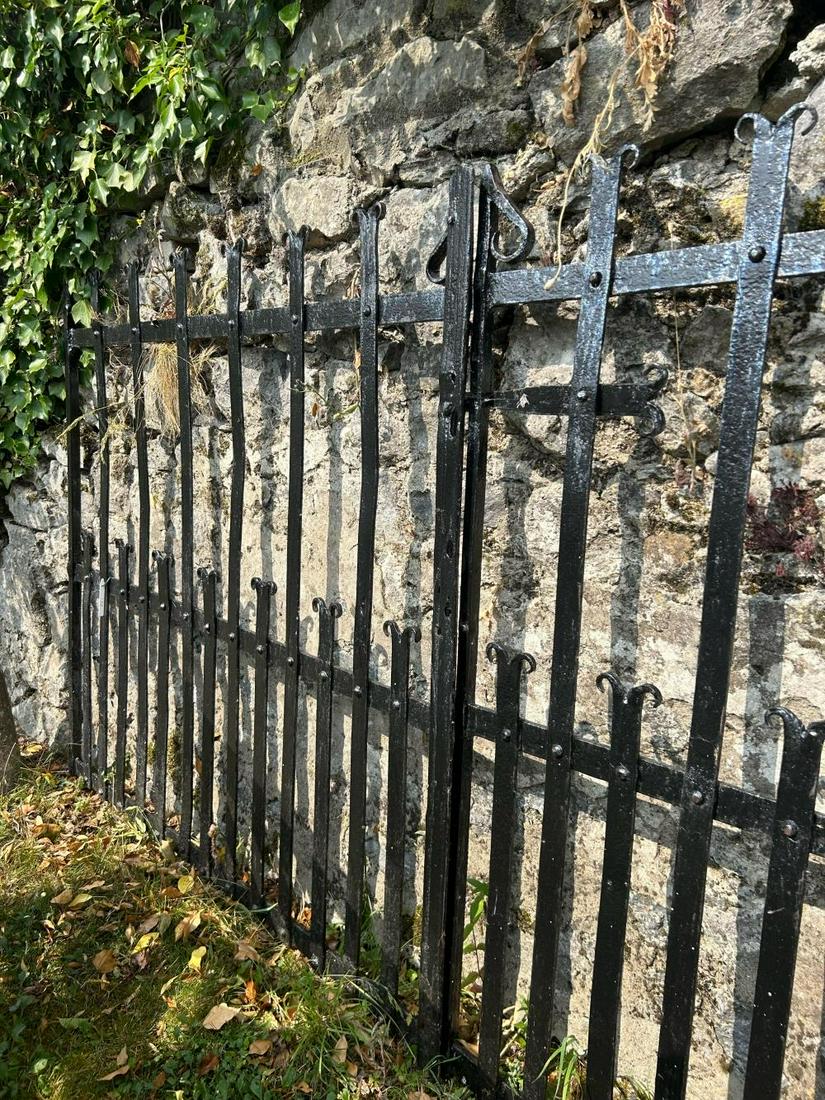 PAIR 19TH-CENTURY FORGED IRON GATES: each with arrowhead finials. 153 cm. high; 280 cm. wide; Approximate Time: 10:28 Lot No: 33 Category: Garden & Decorative Objects