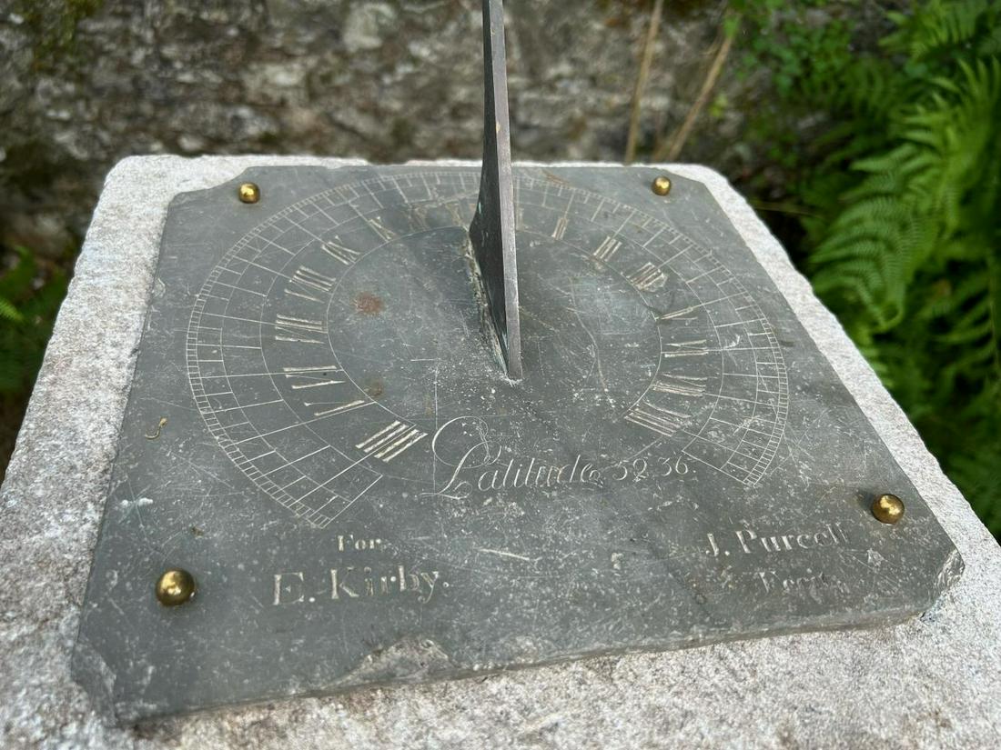 19TH-CENTURY BRONZE SUNDIAL: mounted on a limestone column. Signed J. Carolyn, dated 1895. 135 cm. high; 33 cm. wide; 33 cm. deep Approximate Time: 10:38 Lot No: 44 Category: Garden & Decorative Objects