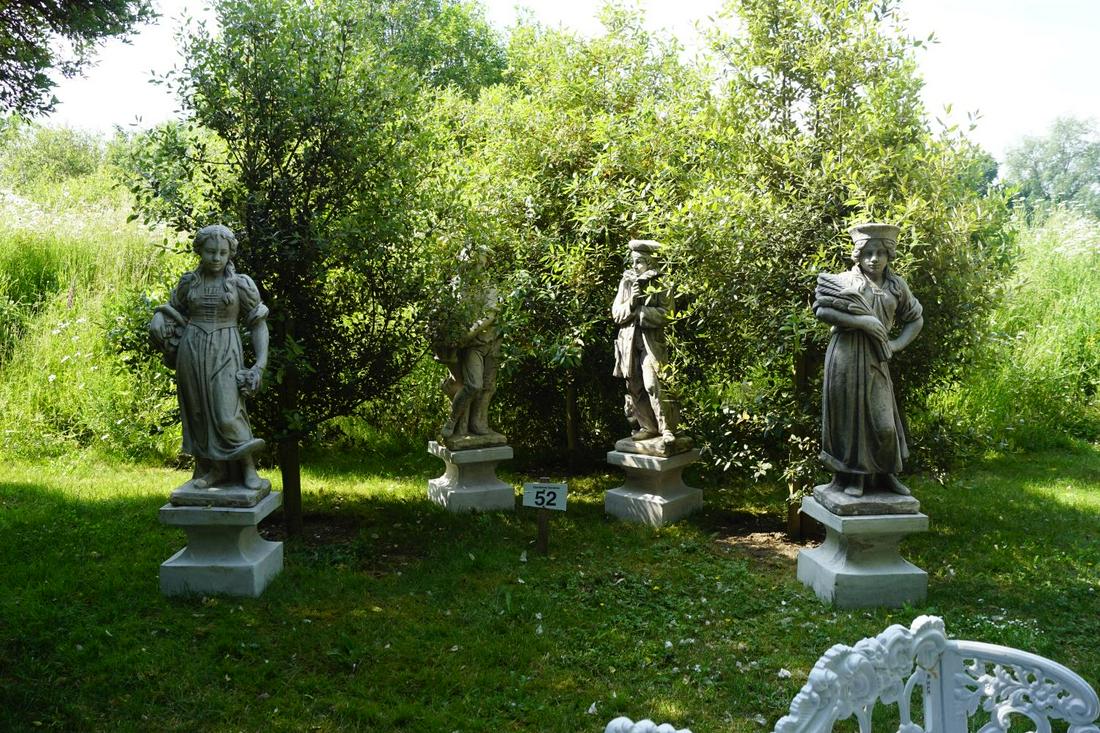 SET OF FOUR MOULDED STONE FIGURES: each an allegory of the four seasons, mounted on a square plinth. 160 cm. high; 45 cm. wide Approximate Time: 10:45 Lot No: 52 Category: Garden & Decorative Objects